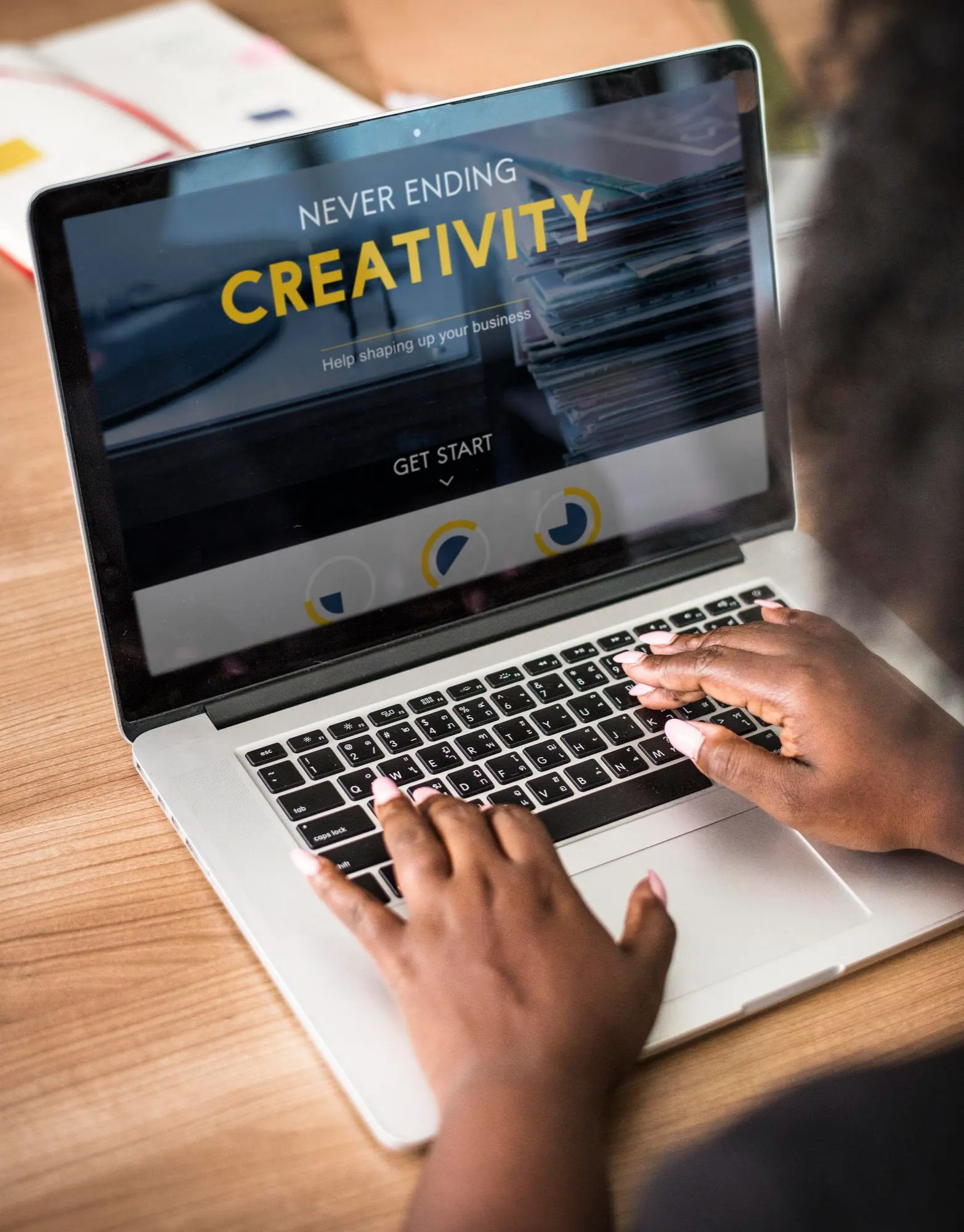 Business owner reviewing their current website on a laptop